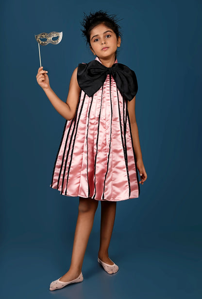 Subtle Pink Meets Black Bow in This Chic Pleated Dress