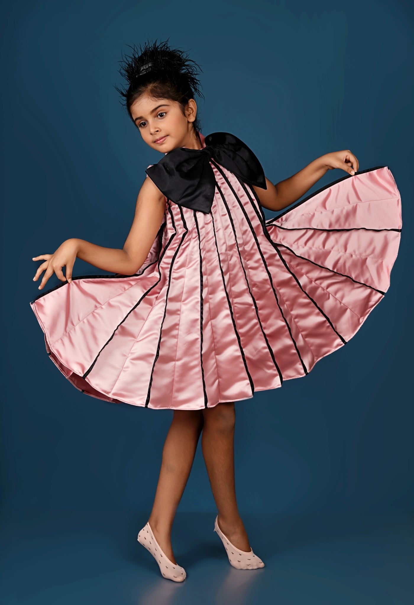 Subtle Pink Meets Black Bow in This Chic Pleated Dress