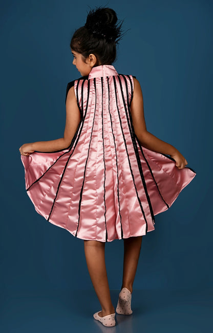 Subtle Pink Meets Black Bow in This Chic Pleated Dress