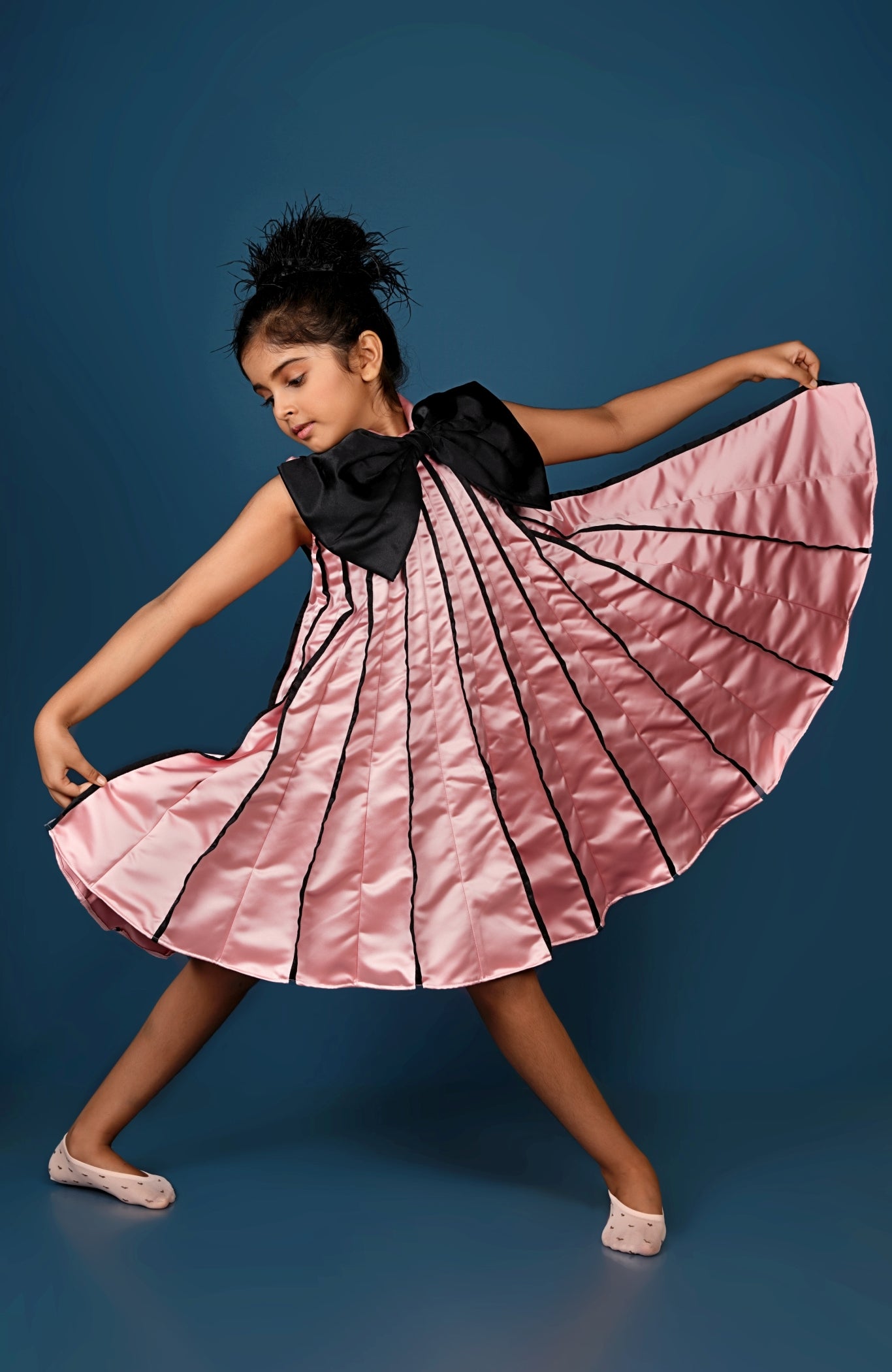 Subtle Pink Meets Black Bow in This Chic Pleated Dress